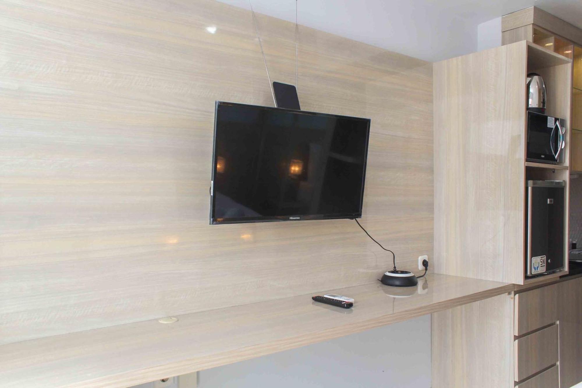 Comfy And Minimalist At Mustika Golf By Travelio Apartemen *